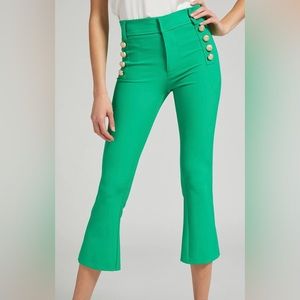 Green pants with gold buttons